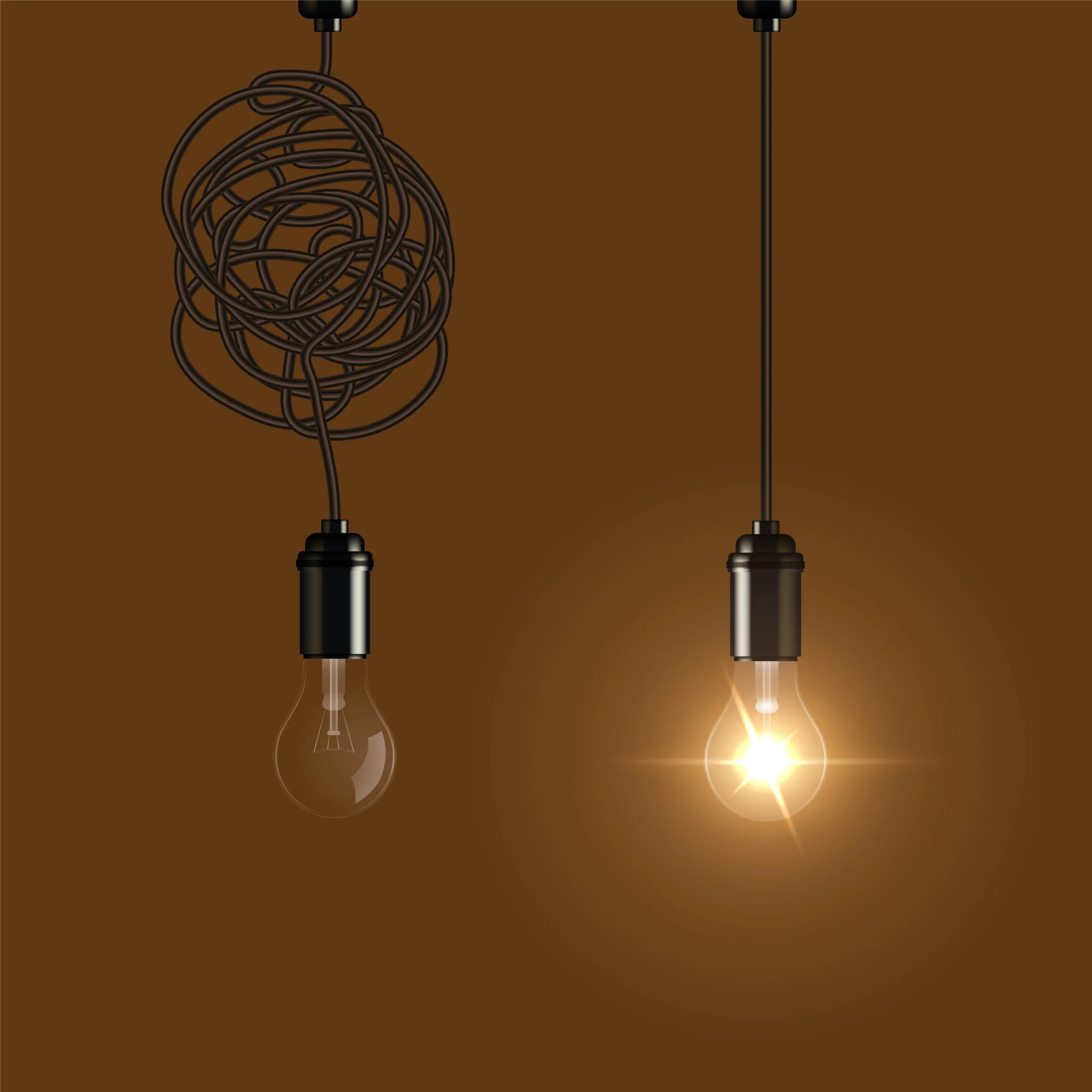 two light bulbs handing down side by side, the right one is illuminated.